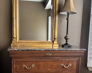 Pair of Henredon Chest with beautiful gold mirror and lamp.