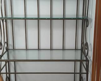 Bakers rack. Has glass shelves as well as shelf on the bottom