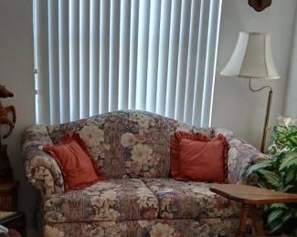 Loveseat in good condition. Could be recovered.