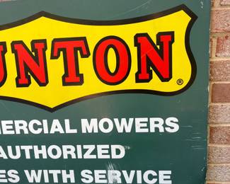 A63 - $100. Bunton Commercial Mowers Double-sided sign. Measures 36” x 24”.