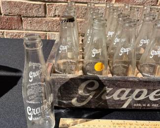 A119 - $165. 1939 Grapette wood crate with 25 6 ounce bottles. Camden Arkansas.