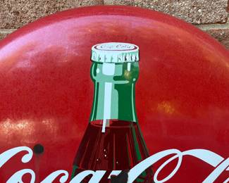 A25 - $550. 1950s Coca-Cola Enameled Bubble Sign. Measures 24” diameter.