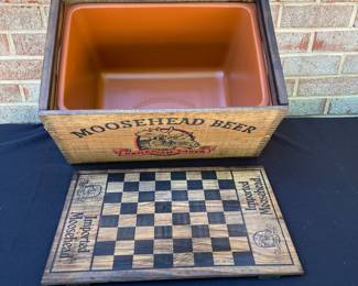 A96 - $100. MooseHead Beer Box, complete with liner. Measures 18” x 12” x 10”.
