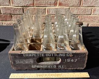 A119 - $165. 1939 Grapette wood crate with 25 6 ounce bottles. Camden Arkansas.