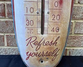 A23 - $200. 1940s Coca-Cola thermostat. Thermostat works. Measure measures 8” x 30”.