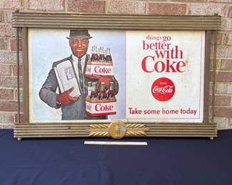A52 - $450. "Things go better with Coke" Coca-Cola Kay Display. (1963) Measures 41" x 25.75". Frame has some chipping paint on the metal accent.