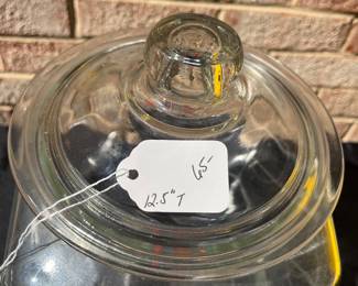 A77 - $65. Lance glass jar. Measures 12.5” tall. Plain glass lid.