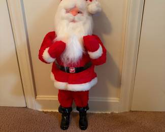 A209 - $100. 1960s Harold Gale Santa 7-Up. Measures 26 inches tall. In good vintage shape.