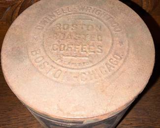 A204 - $40. Caraja Coffee Can. Measures 9.5 inches tall. Some rips on the paper label.