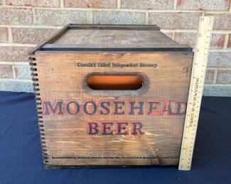 A96 - $100. MooseHead Beer Box, complete with liner. Measures 18” x 12” x 10”.