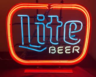 A143 - $100. 1988 Miller "Lite BEER" Neon sign. Works great. Measures 21" x 17.25" tall.