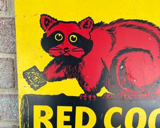 A7 - $40. Vintage Red Coon Chewing Tobacco metal sign. Measures 12” x 18”. Has some small scratches and minimal wear throughout.