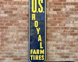 A54 - $650. 1950 US Royal Farm Tires metal sign. Bottom Right is stamped AAW 9-50. Measures 16“ x 60.5“.