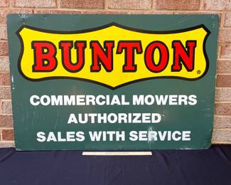 A63 - $100. Bunton Commercial Mowers Double-sided sign. Measures 36” x 24”.