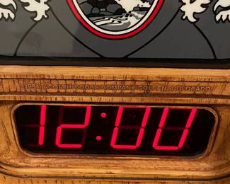A136 - $35. 1981 gray Coors light and digital wall clock. Top not lighting needs a bulb. Light scuff on the face. Measures 10.75" x 16" tall.