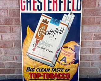 A4 - $250. Chesterfield cigarettes metal sign. Measures 19.25“ x 29“. Has minimal scratches on the paint and the corners have some damage.