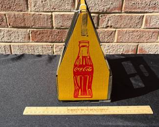 A84 - $60. Six bottle Coca-Cola carrying case. Measures 8.5”x 5.5”