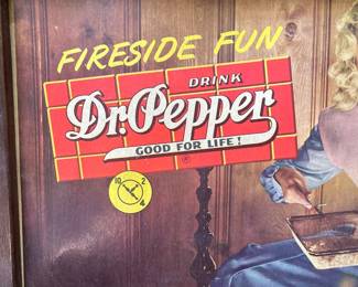 A67 - $550. Dr Pepper “Fireside Fun” cardboard sign with wood frame. Measures 26.5“ x 22“.