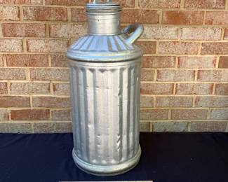 A103 - $60. The Davis welding and manufacturing company antique 5 gallon milk can. Measures 22.5” tall.