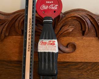 A221 - $25. Drink Coca-Cola cast-iron handle. In good shape.