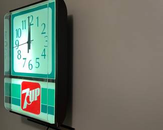 A139 - $100. 7-Up lighted wall clock. Excellent condition. Works perfect perfectly. Measures 12" x 18" tall.