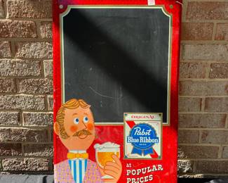 A92 - $60. Pabst Blue Ribbon Beer sign. Measures 17" x 26". Has some scratches, otherwise is in good, vintage shape. Stamped Pabst Brewing Company, Milwaukee Wis. P-616.