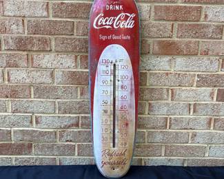 A23 - $200. 1940s Coca-Cola thermostat. Thermostat works. Measure measures 8” x 30”.