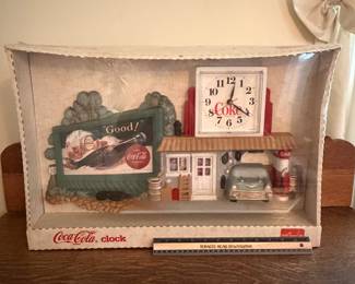A215 - $40. Coca-Cola clock. still in box. Box measures 23 inches by 15 1/2 inches. In perfect shape. I’m