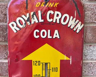 A56 - $85. Vintage Royal Crown Cola thermometer. Measures 10” x 25.5”. Bent and damaged metal on top. Scratches and dents.