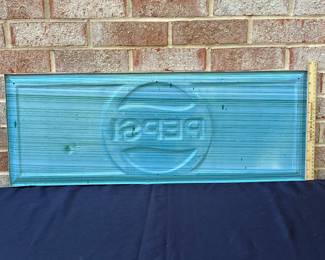 A22 - $130. Metal Pepsi Stout Sign. PM 1134. 1973. Measures 31” x 11.5”.