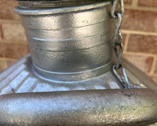 A103 - $60. The Davis welding and manufacturing company antique 5 gallon milk can. Measures 22.5” tall.