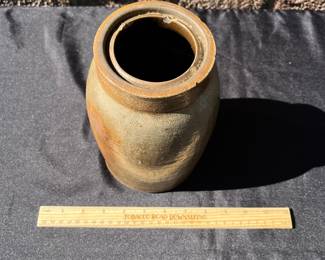 A90 - $50. Antique Salt Glaze Pottery. Measures 8.75” tall. This has some chips along the top.