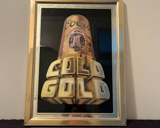A163 - $20. 1986 Coors Cold Gold sign. Measures 14.5" x 19.5" tall.