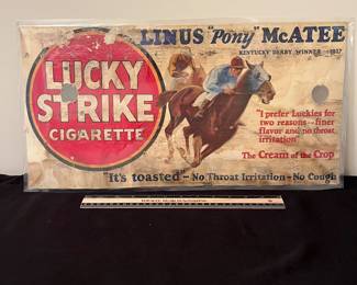 A191 - $300. Lucky Strike Cigarette Trolley Ad. Linus "Pony" McAtee. Sign has been laminated at some point to help protect it. Measures 20" x 10"