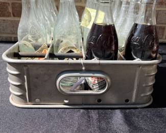 A43 - $165. 1940s Coca-Cola Aluminum Coke Bottle Stadium Carrier. Includes bottles (75th Anniversary bottles)