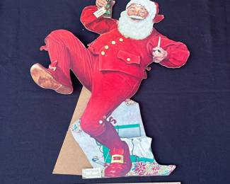 A28 - $45. Norman Rockwell Pepsi Santa Counter Display. Hat ball missing, bent bottle. Measures 20 inches tall.