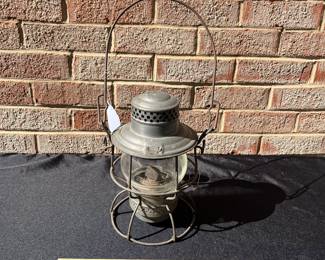 A83 - $65. The Adam’s + Westlake Company R.R. lantern. Measures 9.5” tall.