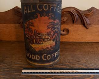 A204 - $40. Caraja Coffee Can. Measures 9.5 inches tall. Some rips on the paper label.