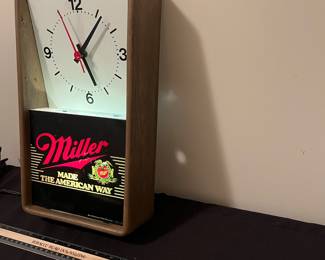A141 - $30. Miller made the American way lighted wall clock. Works perfectly. Measures 8" x 14" tall.