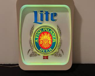 A140 - $45 Miller Lite Everbright bar pub sign. Works perfectly. Measures 14" x 19" tall.
