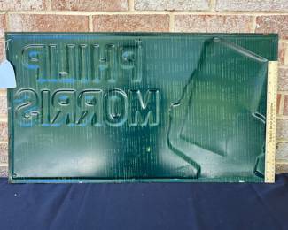 A13 - $550. Vintage Call for Philip Morris metal sign. Stout Sign Co. Measures 15” x 27”. The sign has some wear on the edges, and some scraped off paint. It has some rubbed off paint or rust right in the middle at the top of the sign.