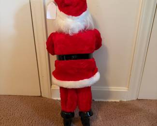 A209 - $100. 1960s Harold Gale Santa 7-Up. Measures 26 inches tall. In good vintage shape.