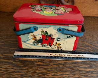A228 - $20. Joe Palooka lunch kit. Measures 7“ x 5“ 4 inches tall. Has paint wear and scratches on the inside. Overall good, used shape.