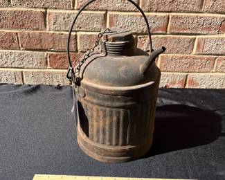 A82 - $40. Antique Railroad oil/kerosene can. Measures 10” tall. It has some dents throughout.