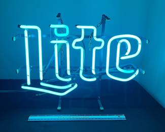 A142 - $60. 1986 Miller "Lite" Neon sign. Works great. Measures 17" x 12" tall.
