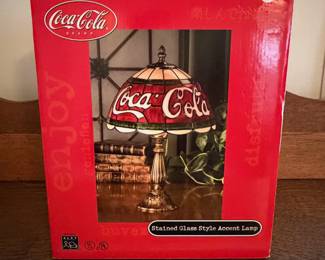 A219 - $35. Coca-Cola stained glass style accent lamp. Still in box. All good.
