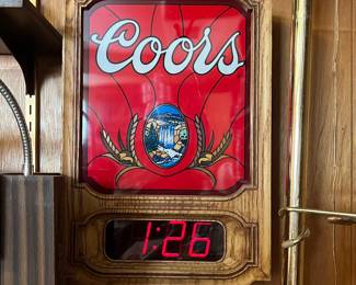 A137 - $35. Red Coors light and digital wall clock. Top not lighting. Needs battery. Measures 10.75" x 16" tall.