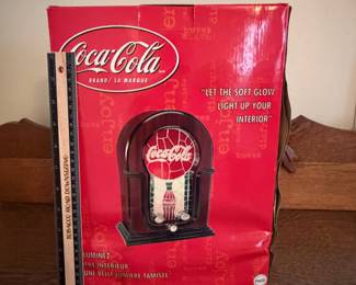 A216 - $35. Coca-Cola AM/FM radio. Still in box, in new great shape.