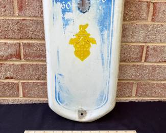 A60 - $35. Packard Vintage Thermometer. The thermometer works. Measure measures 8“ x 39“. Heavy fading.