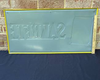 A61 - $20. Reproduction Sakrete embossed tin sign. Measures 28.5” by 14.25”.